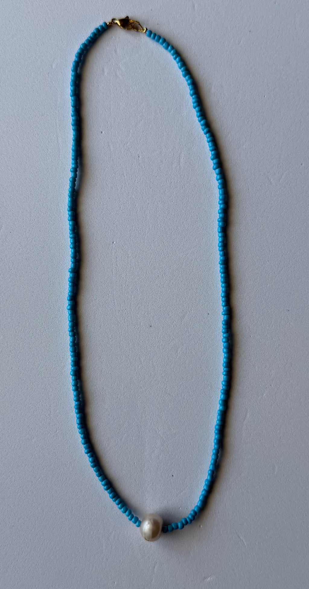 PEARL DROP NECK