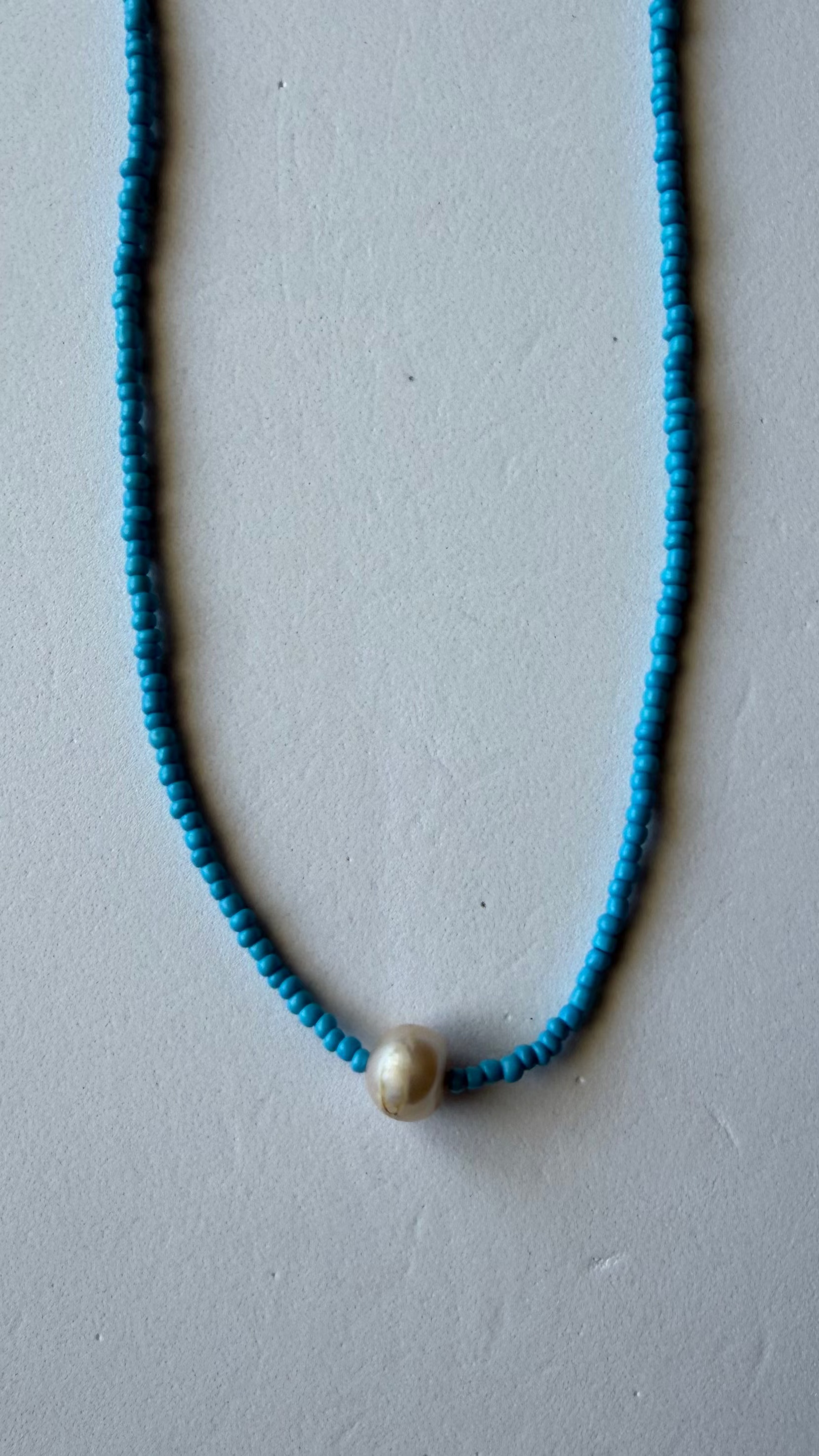 PEARL DROP NECK